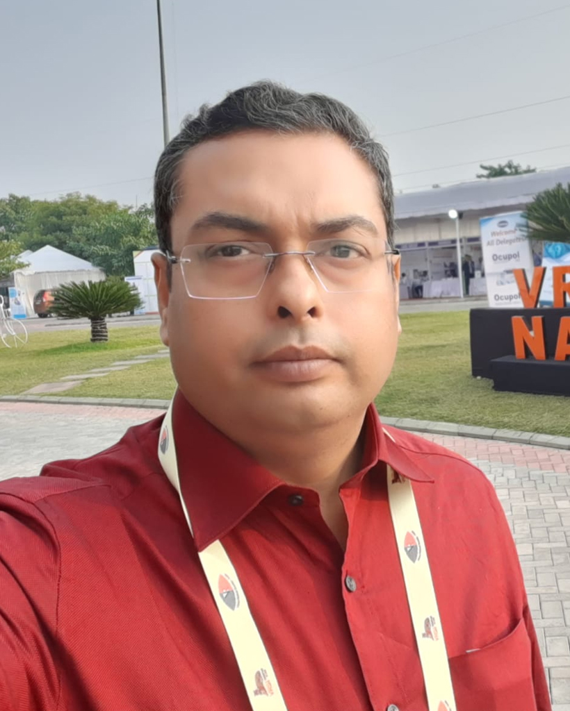 Optometrist looking at eye chart